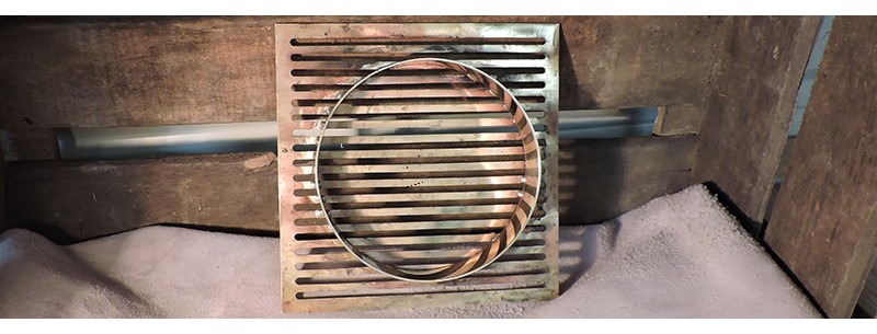 Grille d'aération sur mesure avec brasure d'un cercle d'encastrement