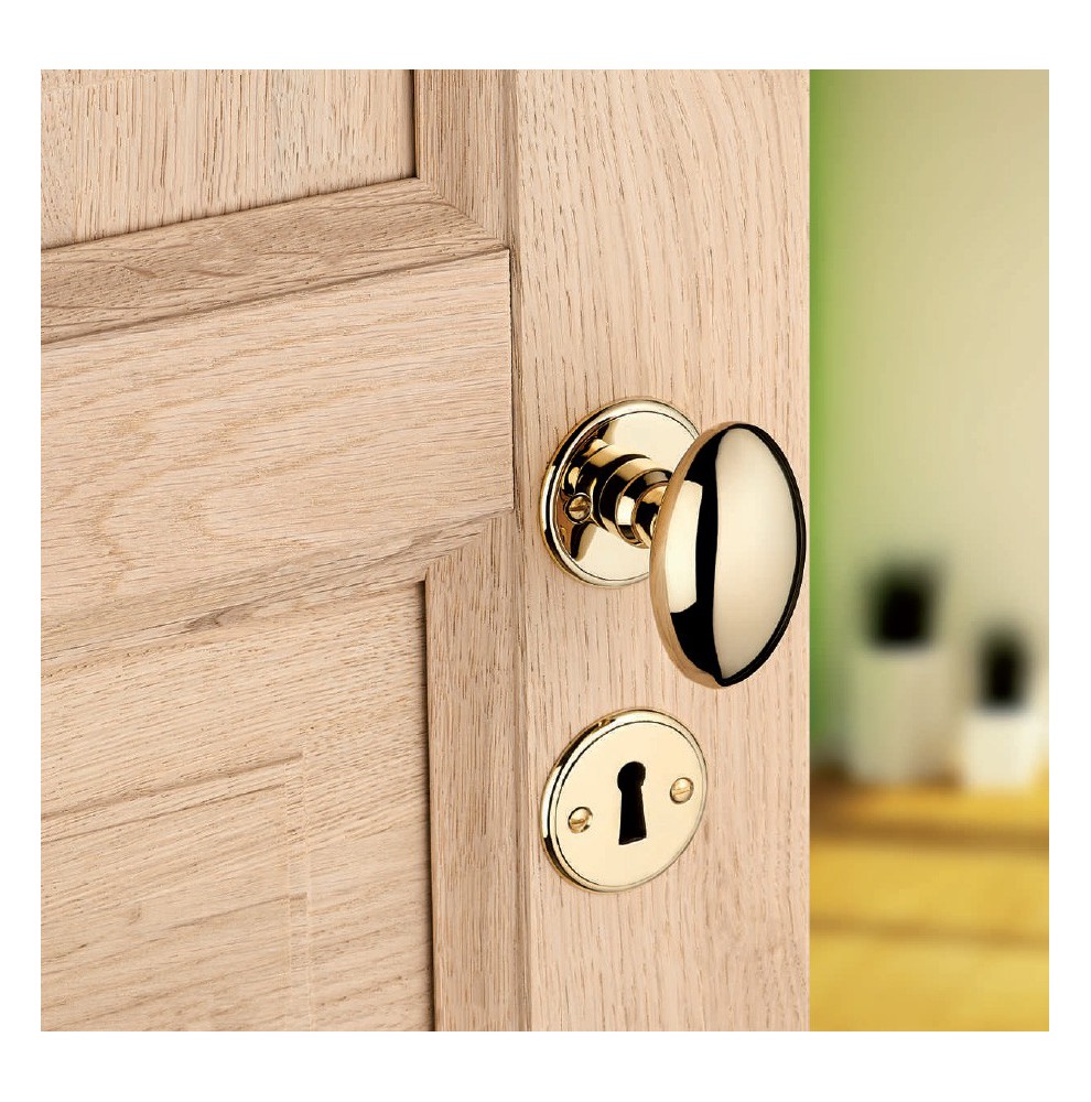 Bouton de porte olive double en laiton poli