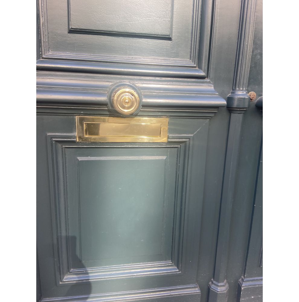 Bouton de porte avec rosace en laiton poli