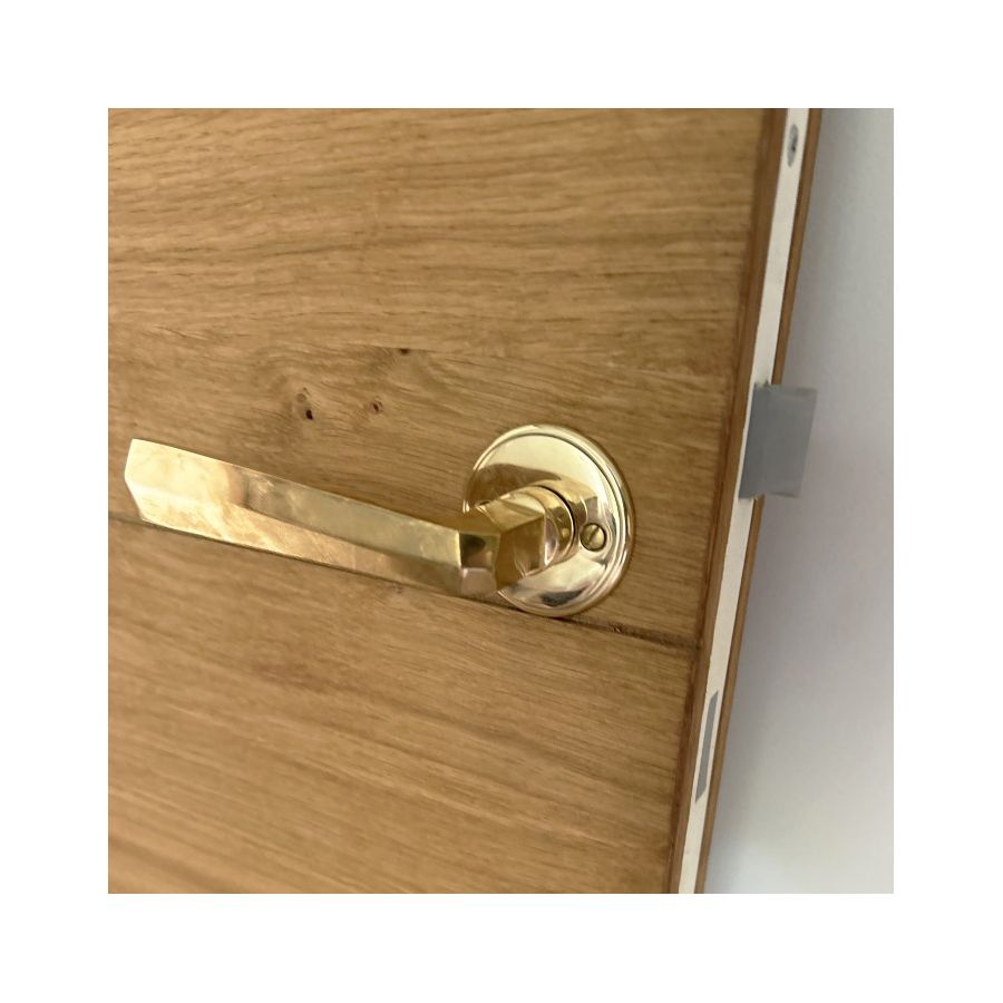 Poignée de porte à pans en laiton
